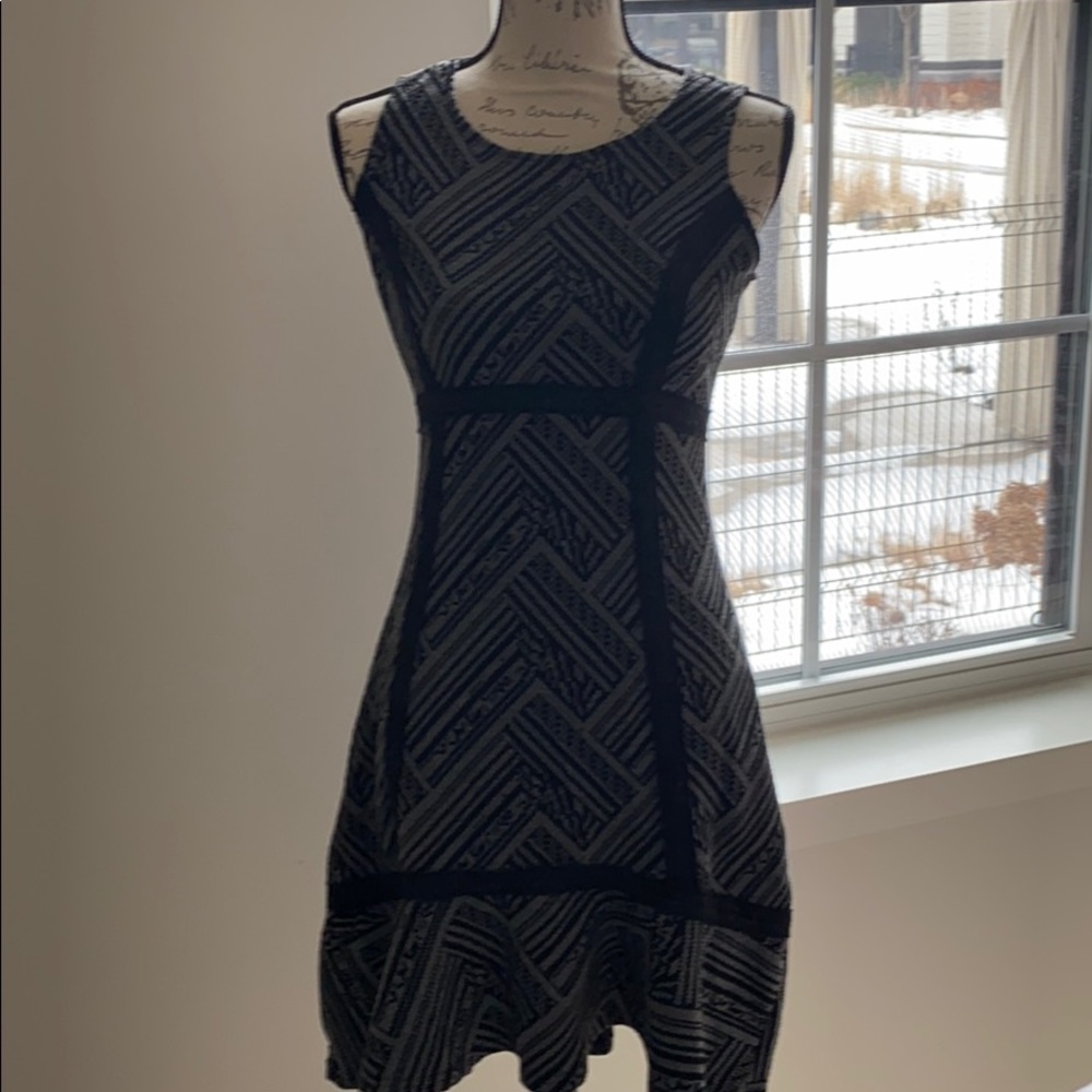 High-waist sleeveless sweater dress with ruffle